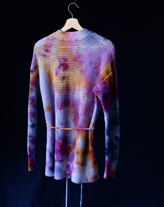 Tie dye cardigan with blue, pink, yellow and purple. Ice dyed to blend colors.